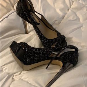 Black studded heels with a sliver heel.